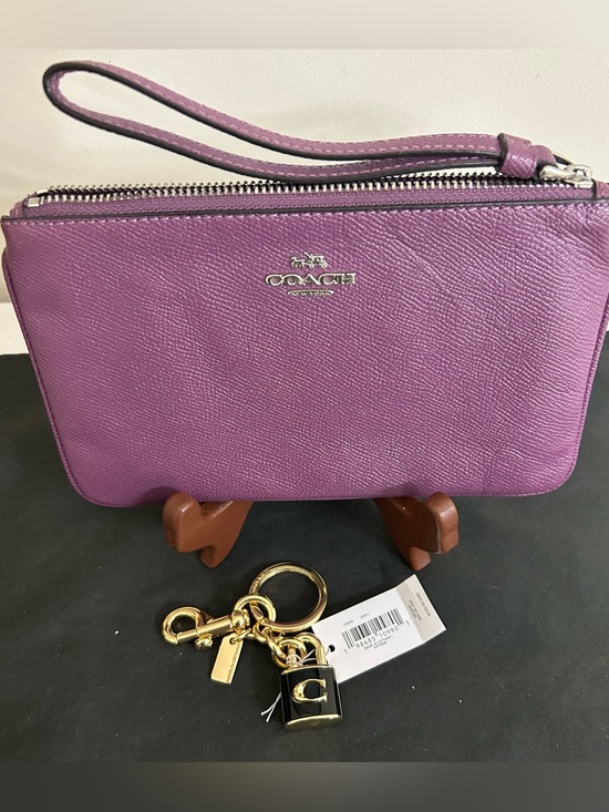 Coach Handbags - NWT Coach Keychain/Bagcharm Lock and Purple Coach Wristlets EUC with dustbag.